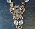 Filligree Crown Drop Necklace with Skull and Cross by KBD Studio